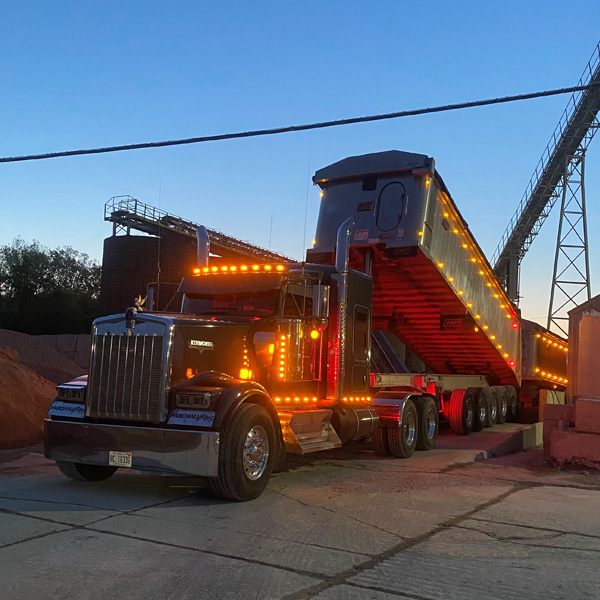 Image of Paschall Brothers Construction dump truck on the job in Michigan. 